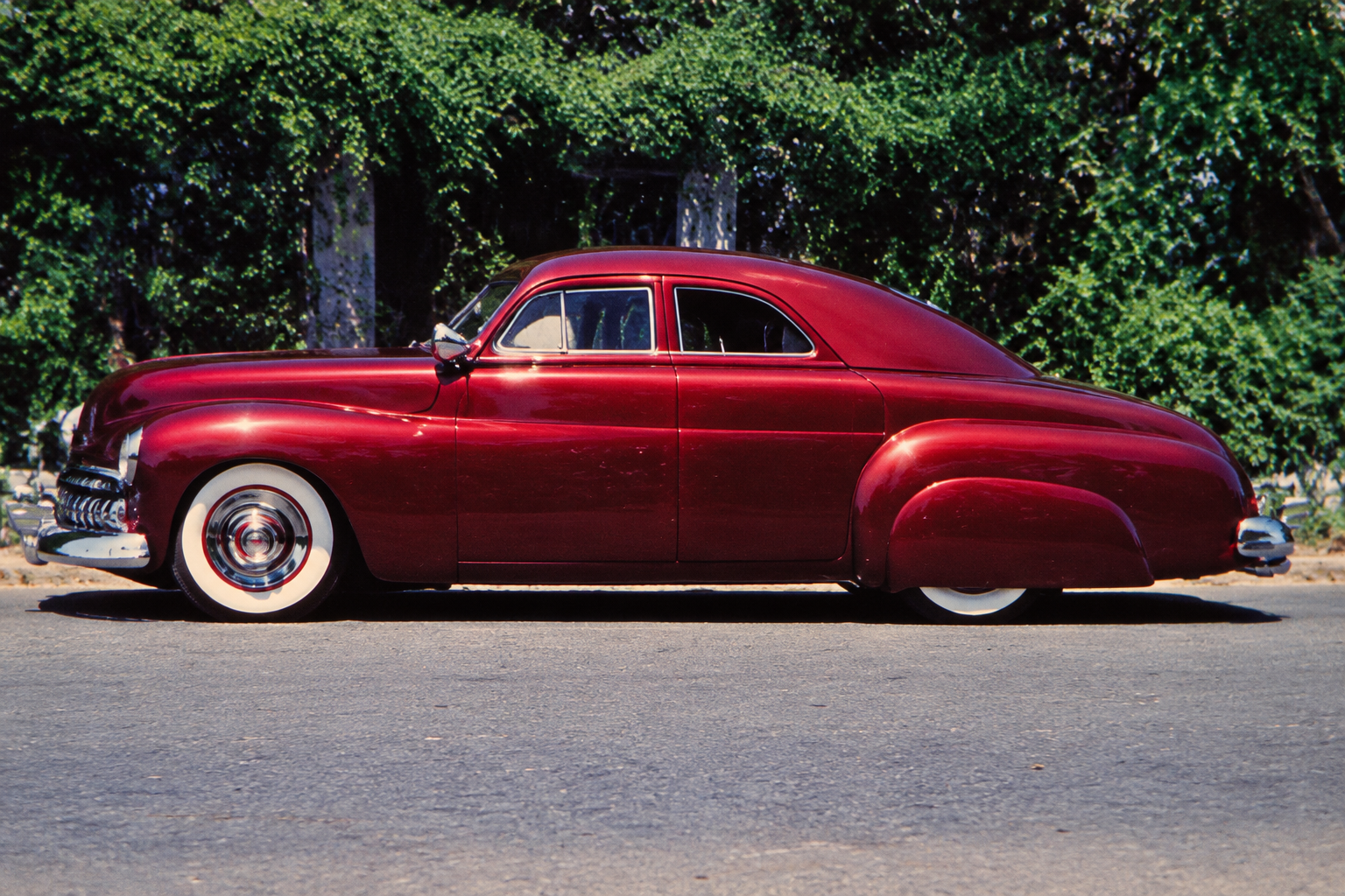 Buddy Ohanesian’s ’40 Mercury, developed through work by Harry Westergard, Less Crane, and Dick Bertolucci. Its removable steel roof became a defining feature.